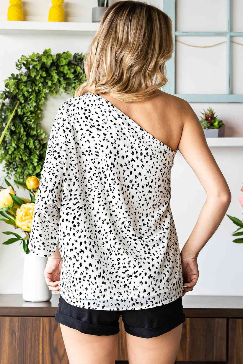 Blusa Asimétrica de Leopardo: Frescura y Elegancia Veraniega