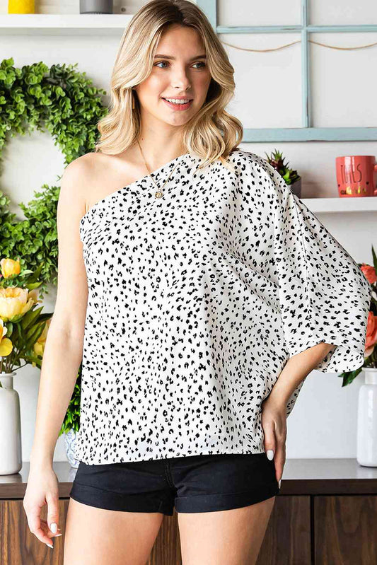Blusa Asimétrica de Leopardo: Frescura y Elegancia Veraniega