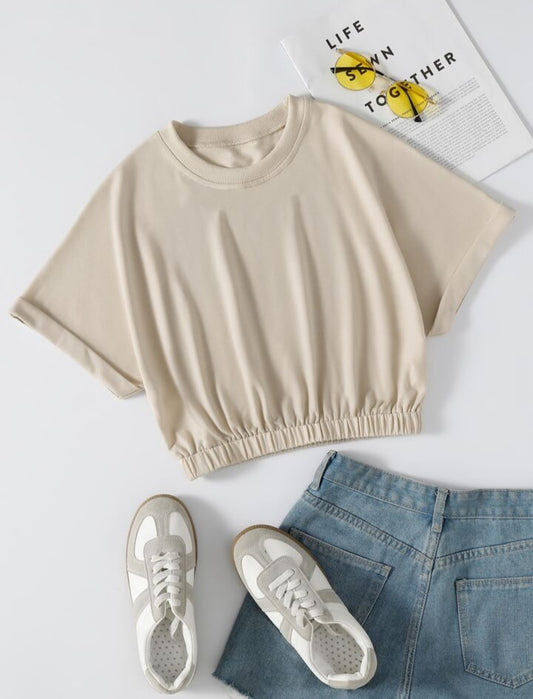 Encanto Desenfadado: La Blusa Cropped Relajada   